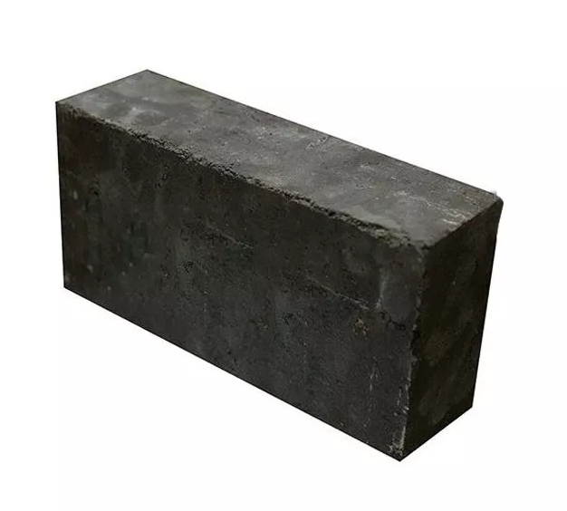 Carbon brick with fused ,magnesia
